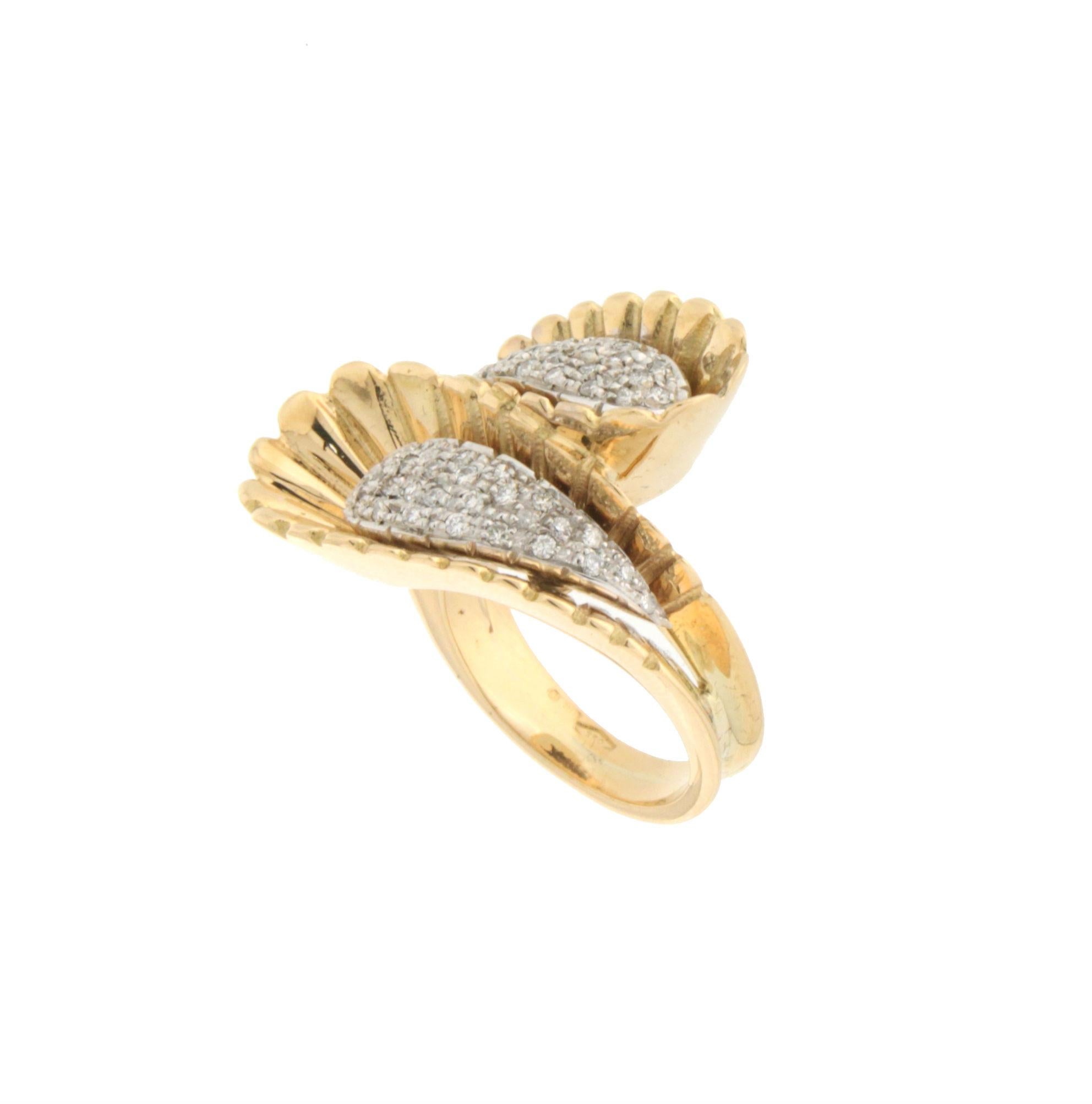 18 karat white and yellow gold cocktail ring. Handmade by our artisans assembled with diamonds.

Diamonds weight 0.40 karat
Ring total weight 19.70 grams
Ring size 13.90 Ita

(all rings are can be resized)