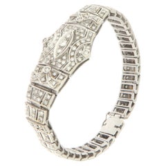 Bracelet manchette artisanal en or blanc 18 carats et diamants