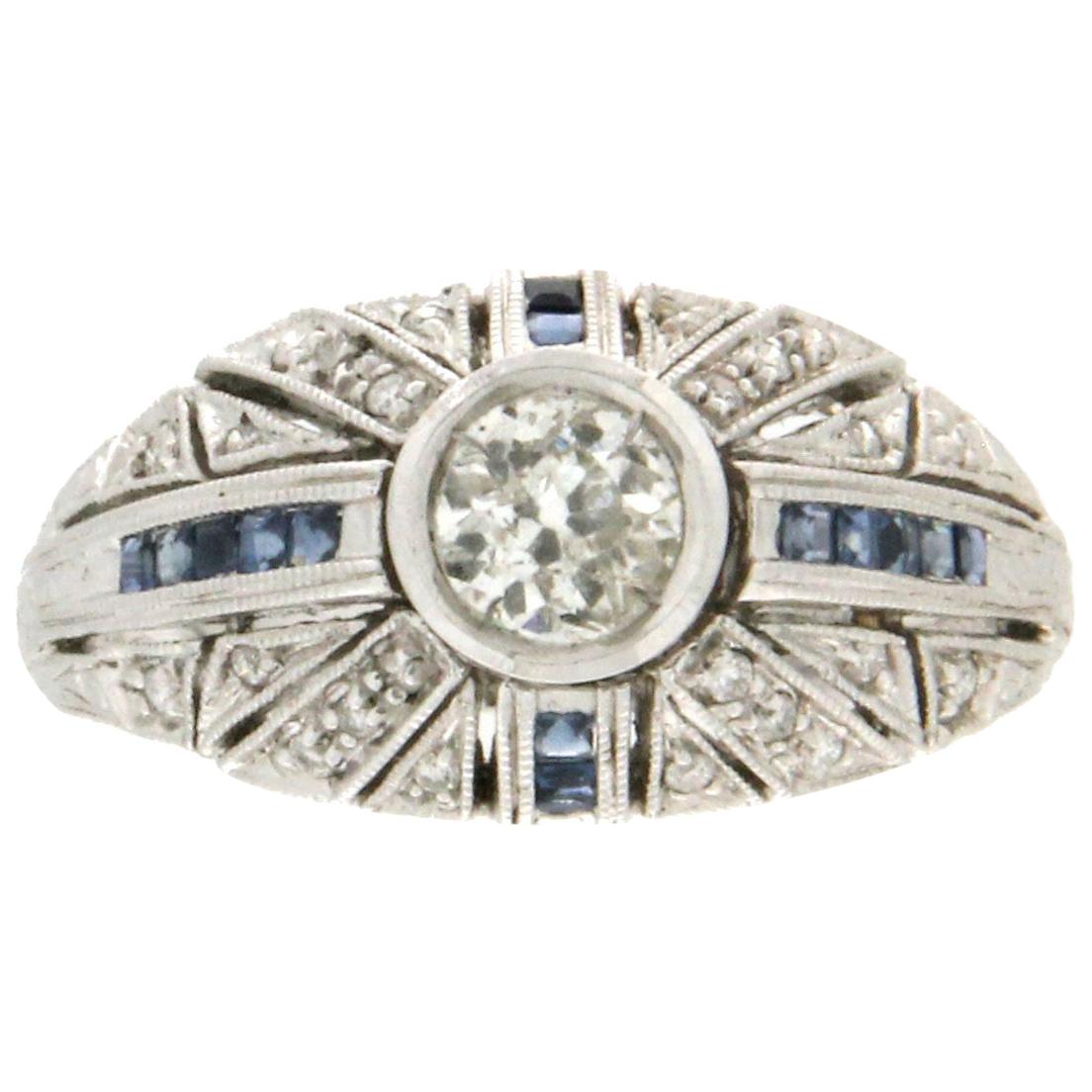 This exquisite 18kt white gold ring is a true embodiment of elegance and sophistication. Designed to captivate, the ring features a stunning arrangement of brilliant-cut diamonds, totaling 0.70ct, carefully selected for their exceptional clarity and