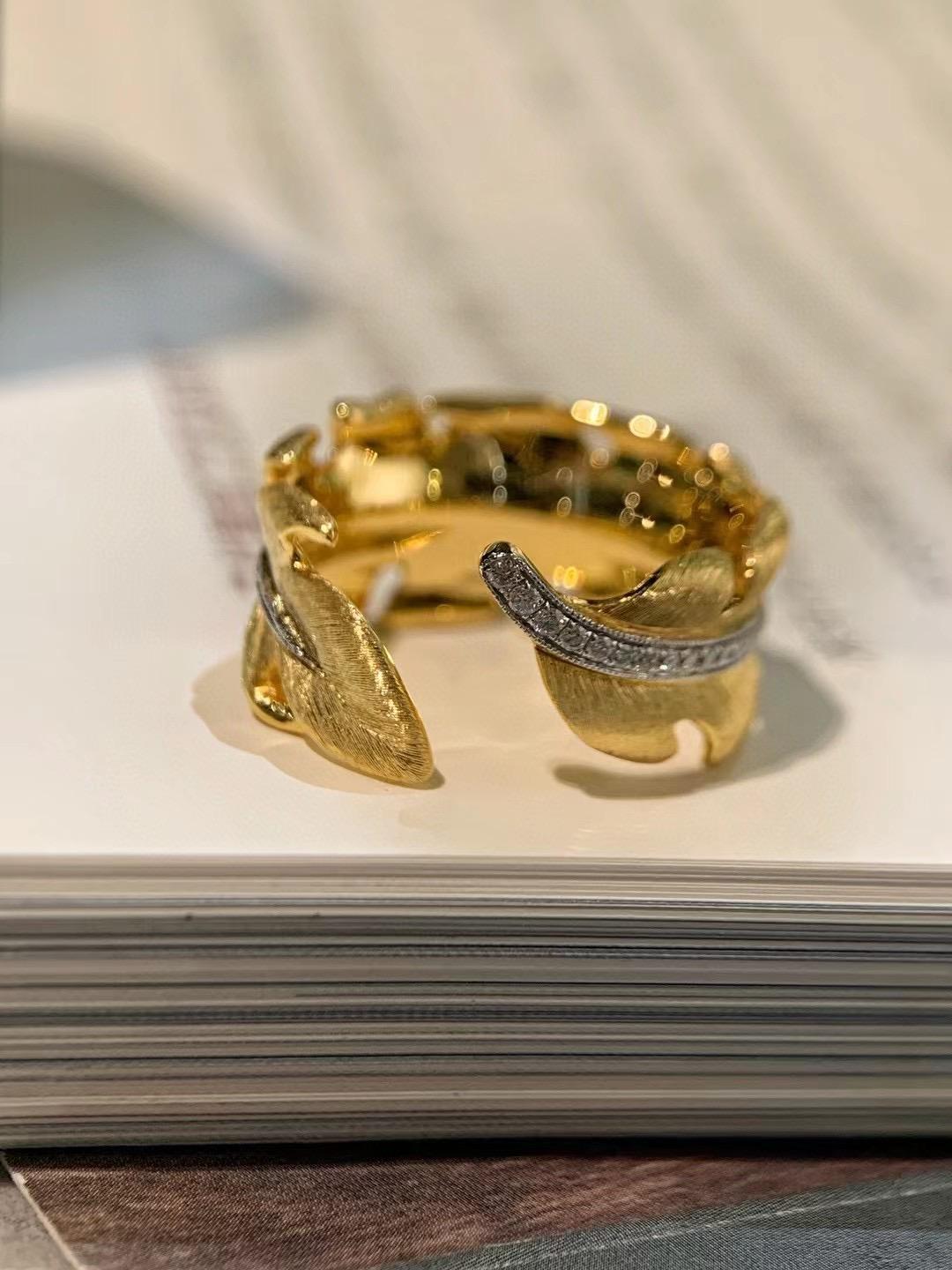 Handcraft 18K Gold Leaf-Shaped Natural Diamond Ring

Diamonds - 0.241 CT
18K Gold - 6.84 GM
