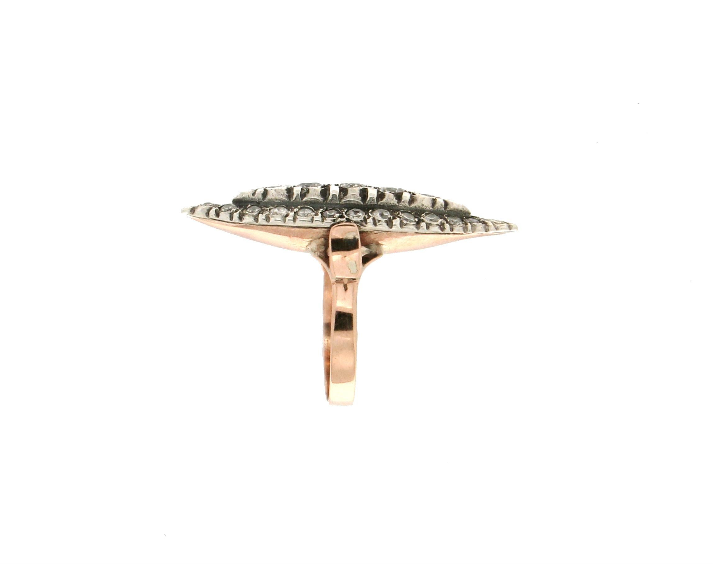 9 Karat yellow gold and 925 karat silver cocktail ring. Handmade assembled with diamonds.

Ring total weight 7.10 grams
Diamonds weight 1.25 karat
Ring size ITA 15 - US 7.25