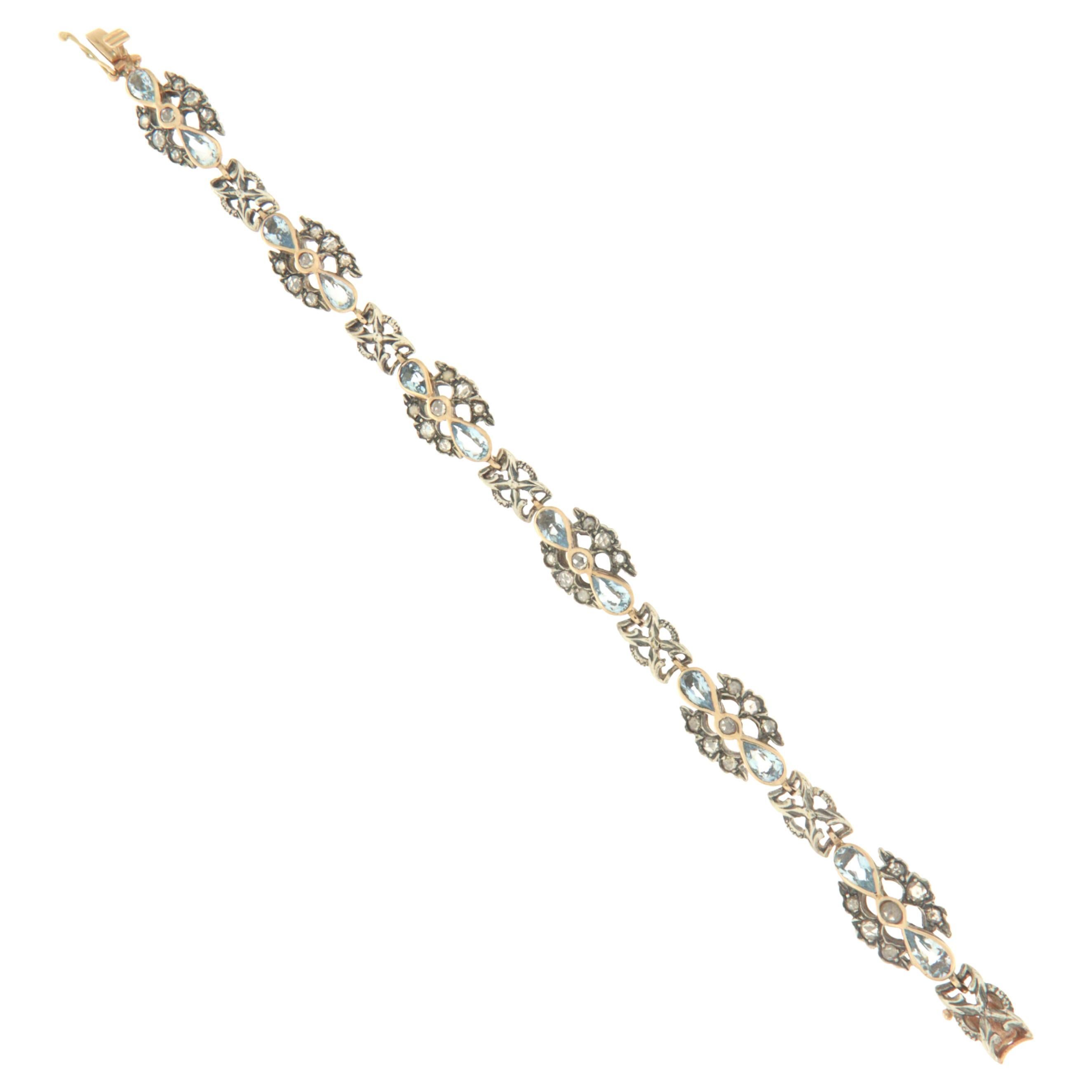 Bracelet manchette artisanal en or jaune 14 carats avec aigue-marine et diamants en vente