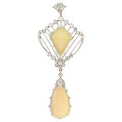Collier pendentif artisanal en or blanc 18 carats avec opale d'Australie et diamants