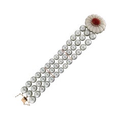 Bracelet manchette artisanal en or 14 carats, perles d'Australie, diamants et agate de corail