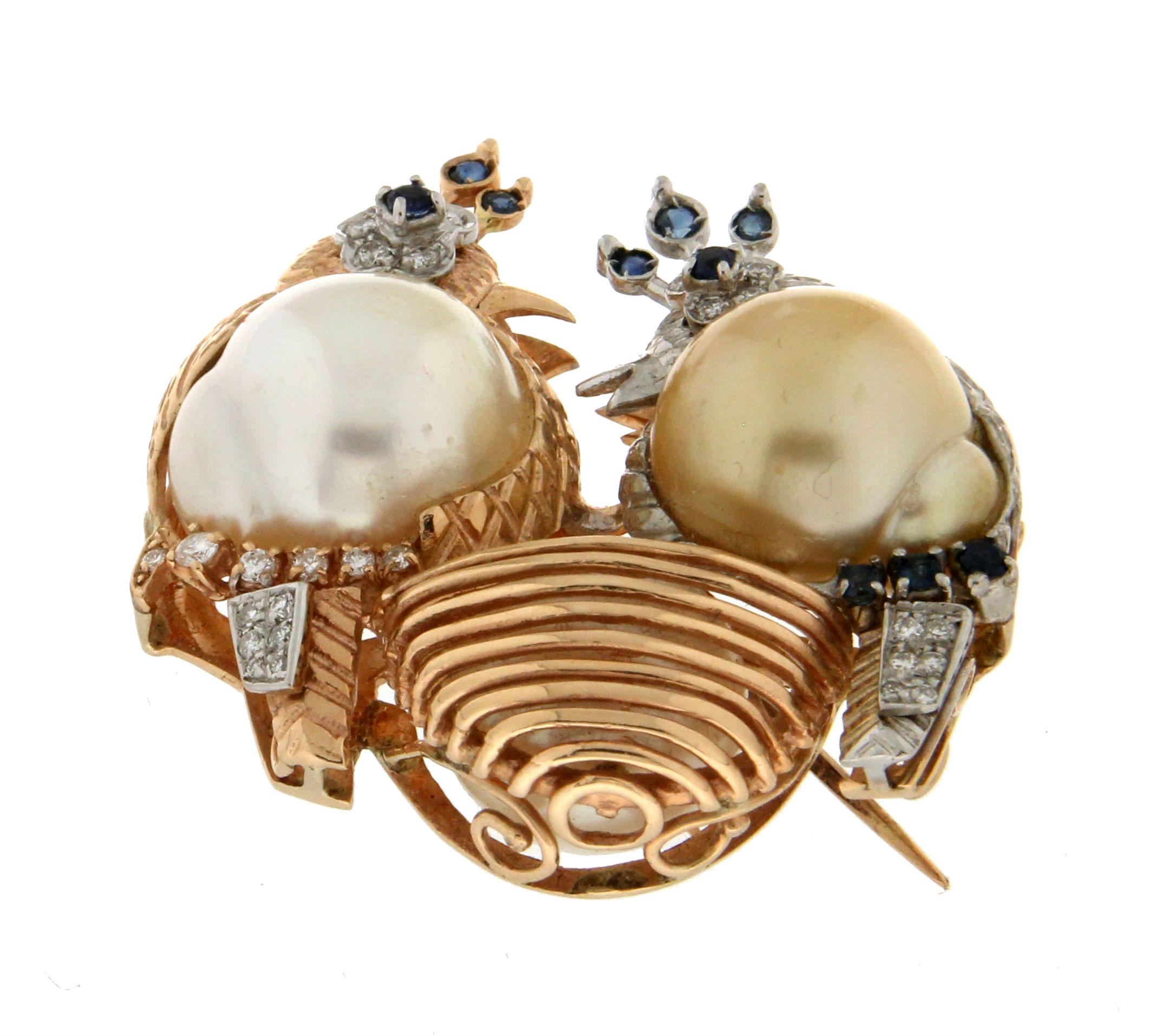 Handcraft Birds 14 Karat White And Yellow Gold Australian Baroque Pearls Diamonds Sapphires Brooch
Made entirely by hand by our craftsmen.

Brooch total weight 24.40 grams
Pearls weight 54 karat
Pearls size 15 mm
Diamonds weight 0.29 karat
