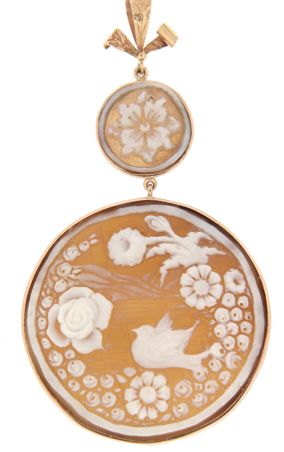 Beautiful pendant created in 9 karat yellow gold with two antique cameo pieces. Pendant created entirely by hand.

Pendant total weight 15.60 grams
(the price is without chain)