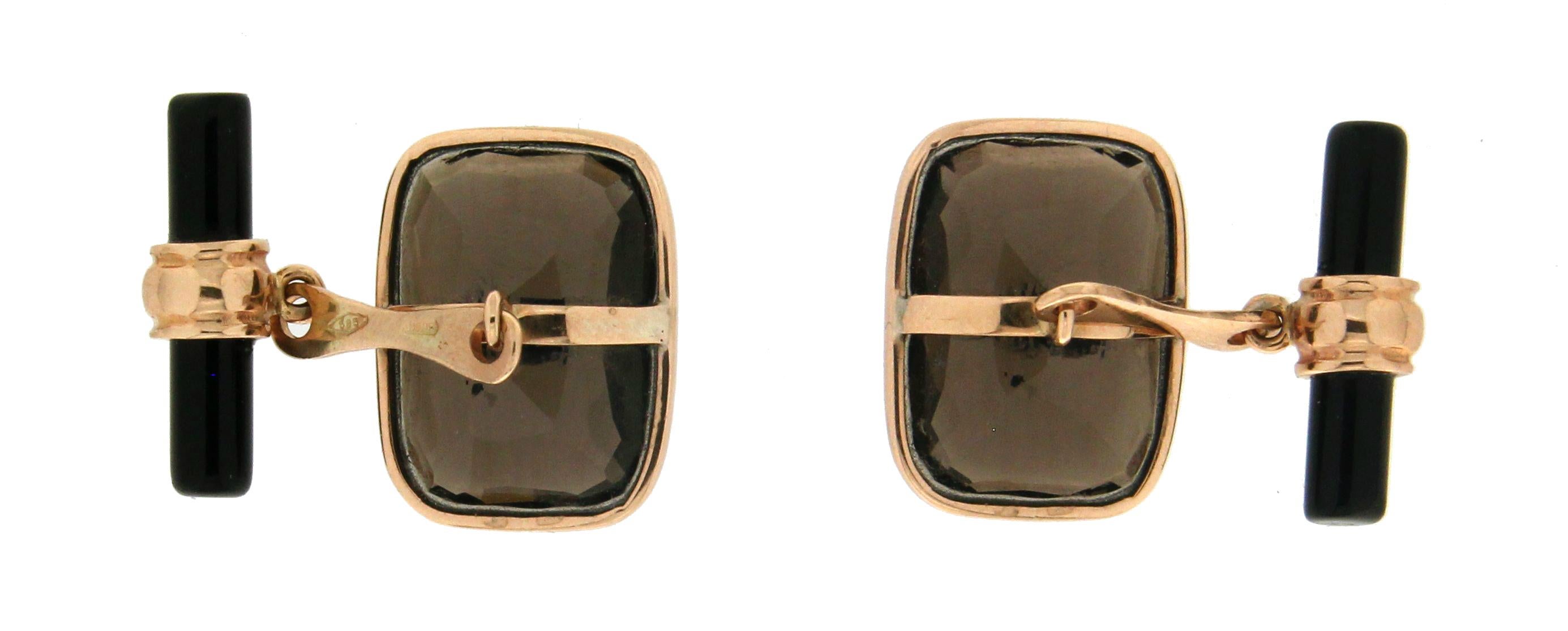 14 Karat yellow gold cufflinks. Handmade by our craftsmen assembled with citrine and onyx barrels.

Citrine weight 3.80 grams
Cufflinks total weight 10 grams