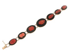 Bracciale artigianale in corallo e onice in oro giallo 14 carati