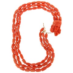 Collier multibrins artisanal en or jaune 18 carats et corail