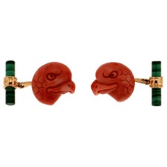 Gemelli artigianali in corallo e aquile in oro giallo 18 carati con malachite
