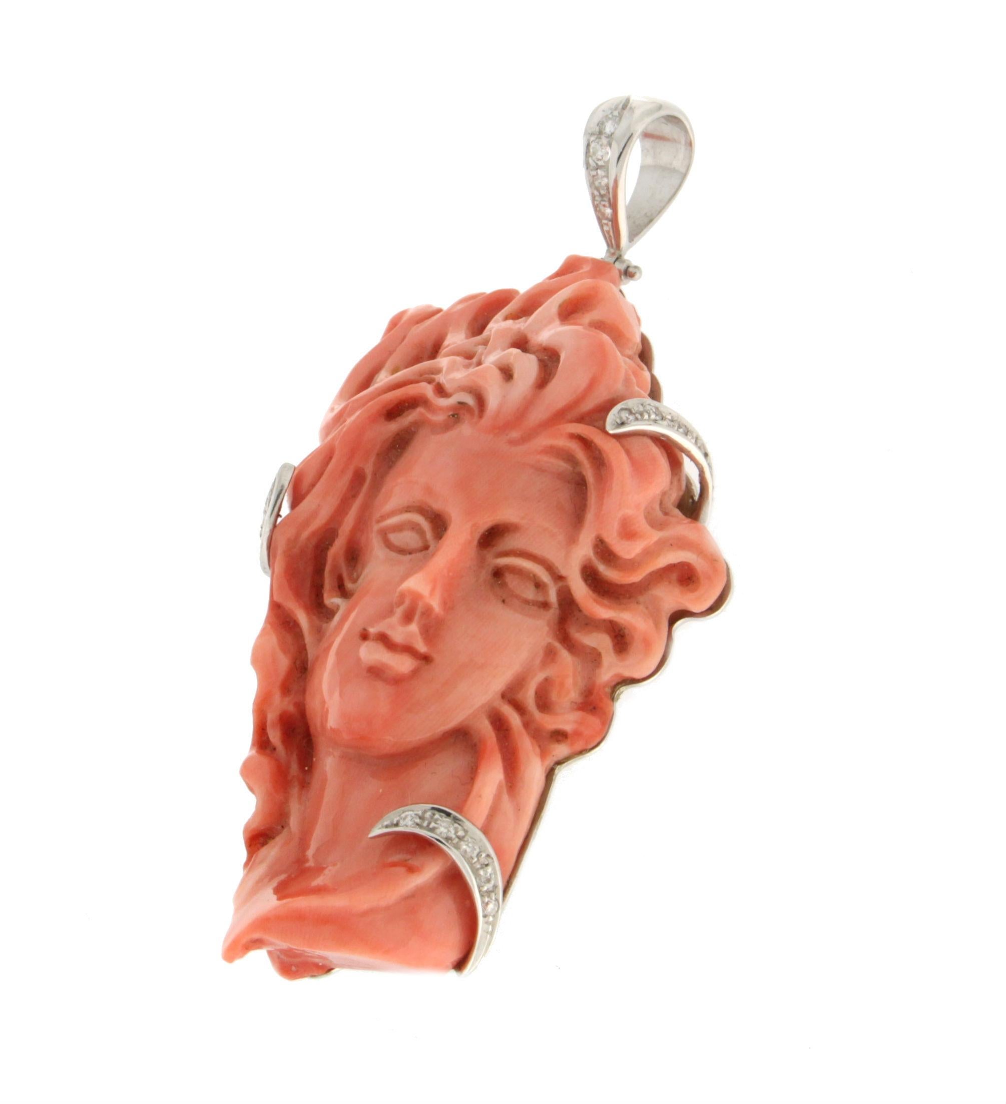 pendant with woman's face