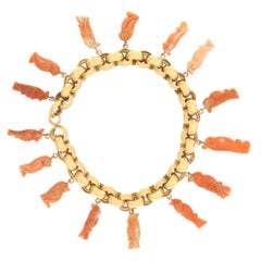 Bracciale artigianale Coralli Gufo in oro giallo 18 carati