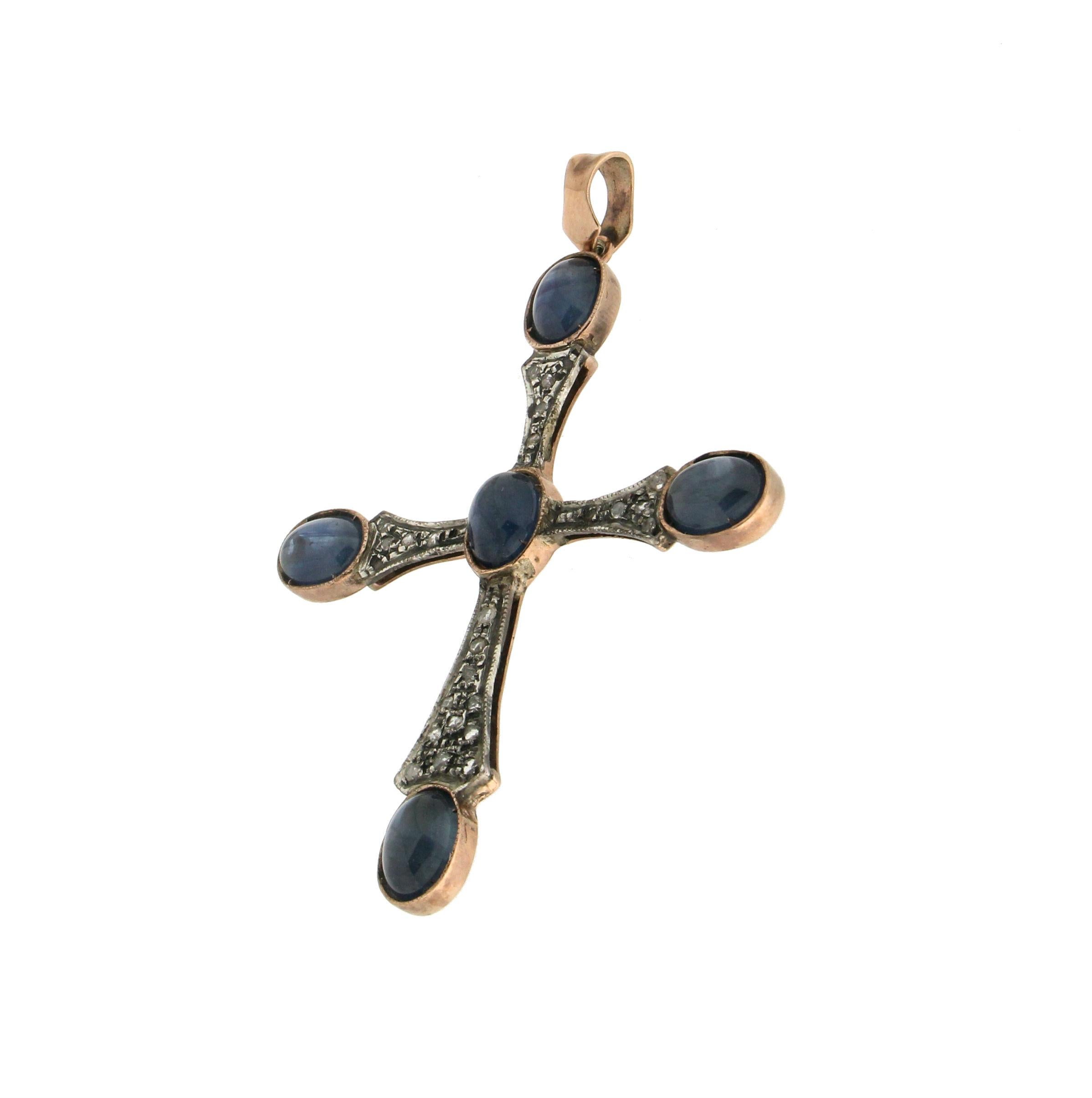 9 karat yellow gold and silver pendant necklace. Handmade by artisans and assembled with sapphires and 
 old cut diamonds

Diamonds weight 0.44 karat
Pendant total weight 9.80 grams
(the price is without chain)