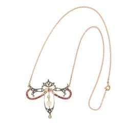 Collana con ciondolo di rubini in oro giallo 14 carati, realizzata a mano