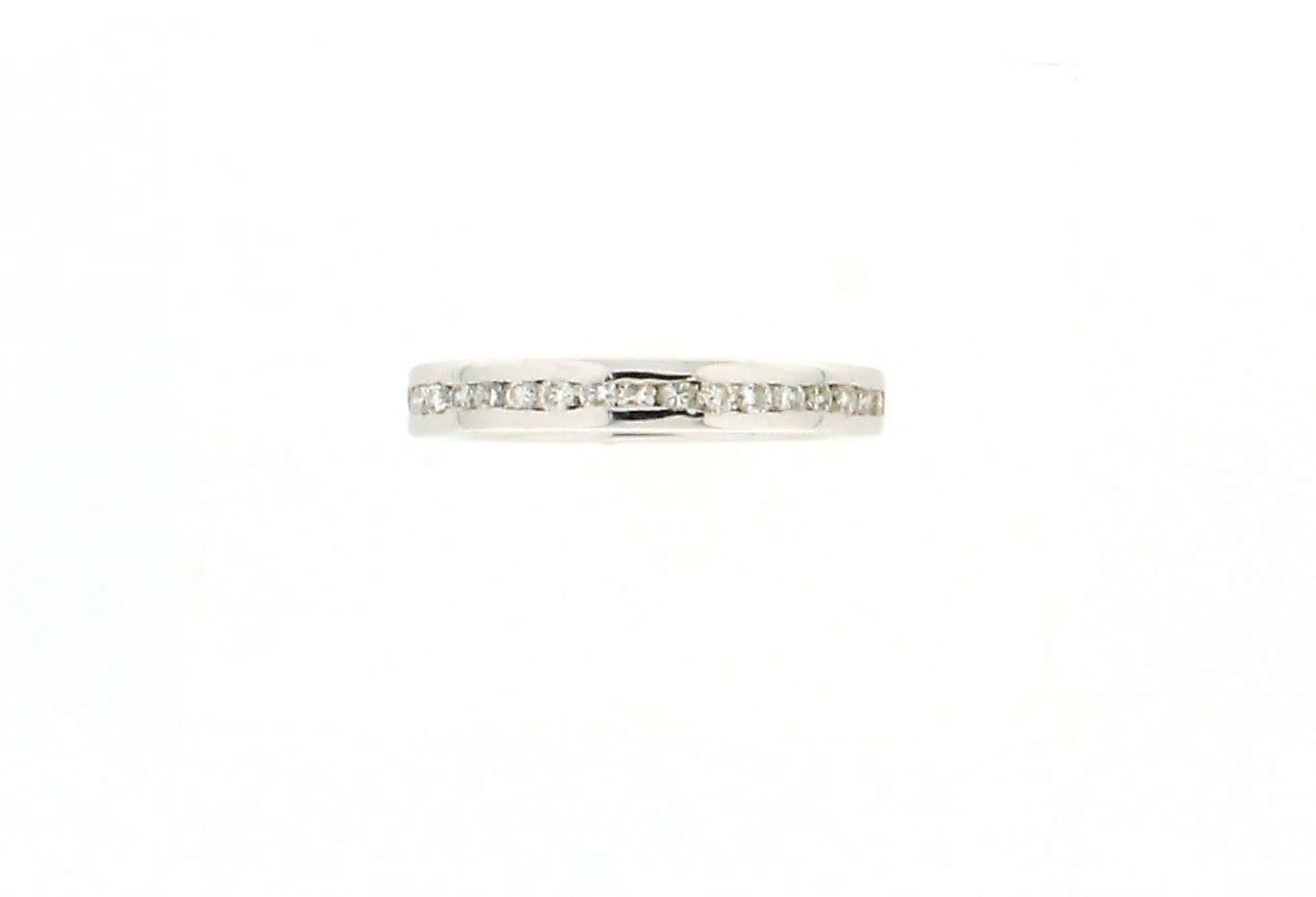 Add a touch of timeless elegance to your jewelry collection with this exquisite eternity band, crafted in luxurious 18K white gold.

The ring features a classic circular band design, symbolizing eternal love and commitment. It is meticulously