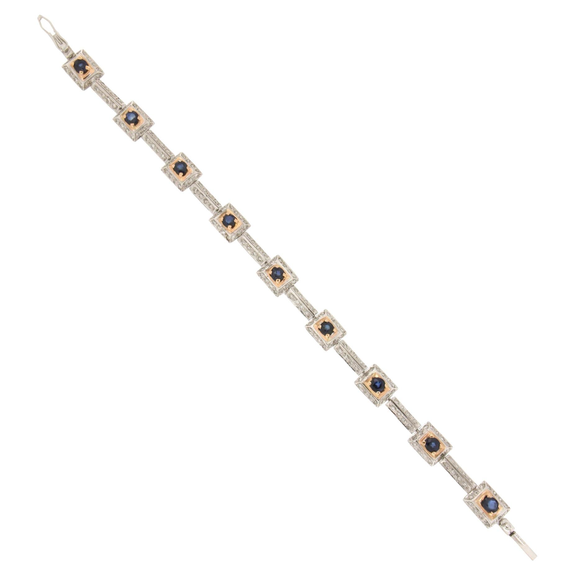 Bracelet manchette artisanal en or blanc 18 carats avec diamants et saphirs