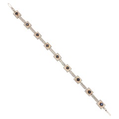 Handgefertigtes Manschettenarmband aus 18 Karat Weißgold mit Diamanten und Saphiren