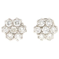 Clous d'oreilles artisanaux en or blanc 18 carats et diamants