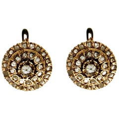 Clous d'oreilles artisanaux en or jaune 9 carats et diamants