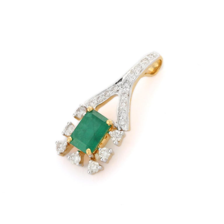 Natural Emerald pendant in 18K Gold. It has a octagon cut emerald studded with diamonds that completes your look with a decent touch. Pendants are used to wear or gifted to represent love and promises. It's an attractive jewelry piece that goes with