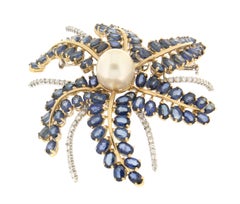Broche fleur en or jaune et blanc 18 carats saphirs diamants perles Handcraft