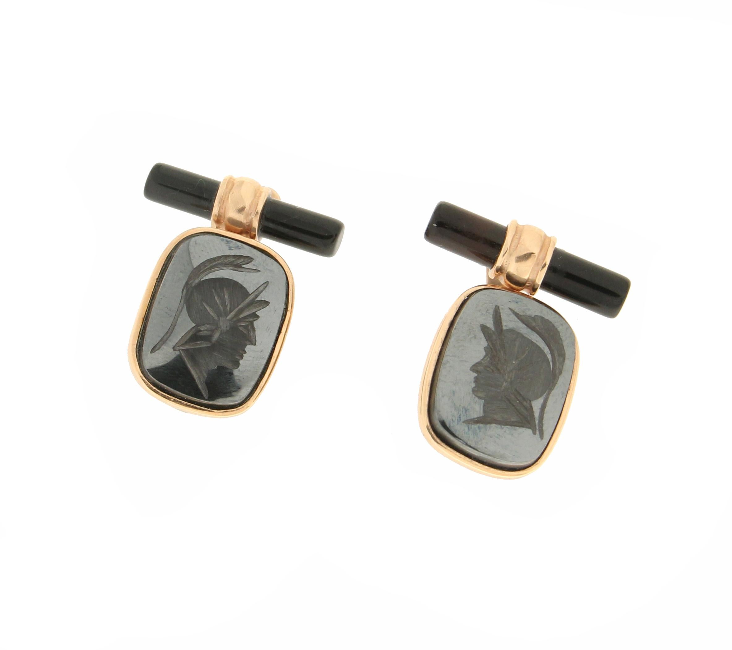 18 Karat yellow gold cufflinks. Handmade by our craftsmen and assembled with barrels onyx and hematite with warrior figure

Cufflinks total weight 10.20 grams