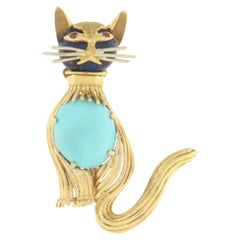 Brooche chat artisanale en or jaune 18 carats, lapis-lazuli, rubis et turquoise