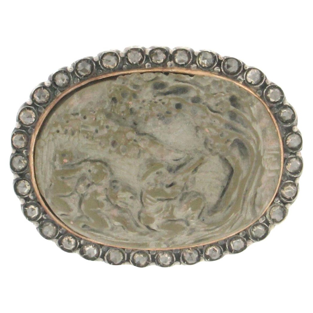 Spilla artigianale con cammeo di lava in oro 14 carati e diamanti in argento in vendita