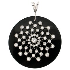 Collier pendentif artisanal en onyx, or blanc 18 carats et diamants