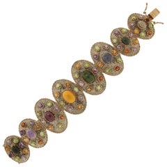 Bracciale artigianale con peridoto e citrino in oro giallo 14 carati