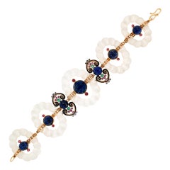 Bracelet manchette artisanal en cristal de roche, or jaune 14 carats, diamants et lapis-lazuli