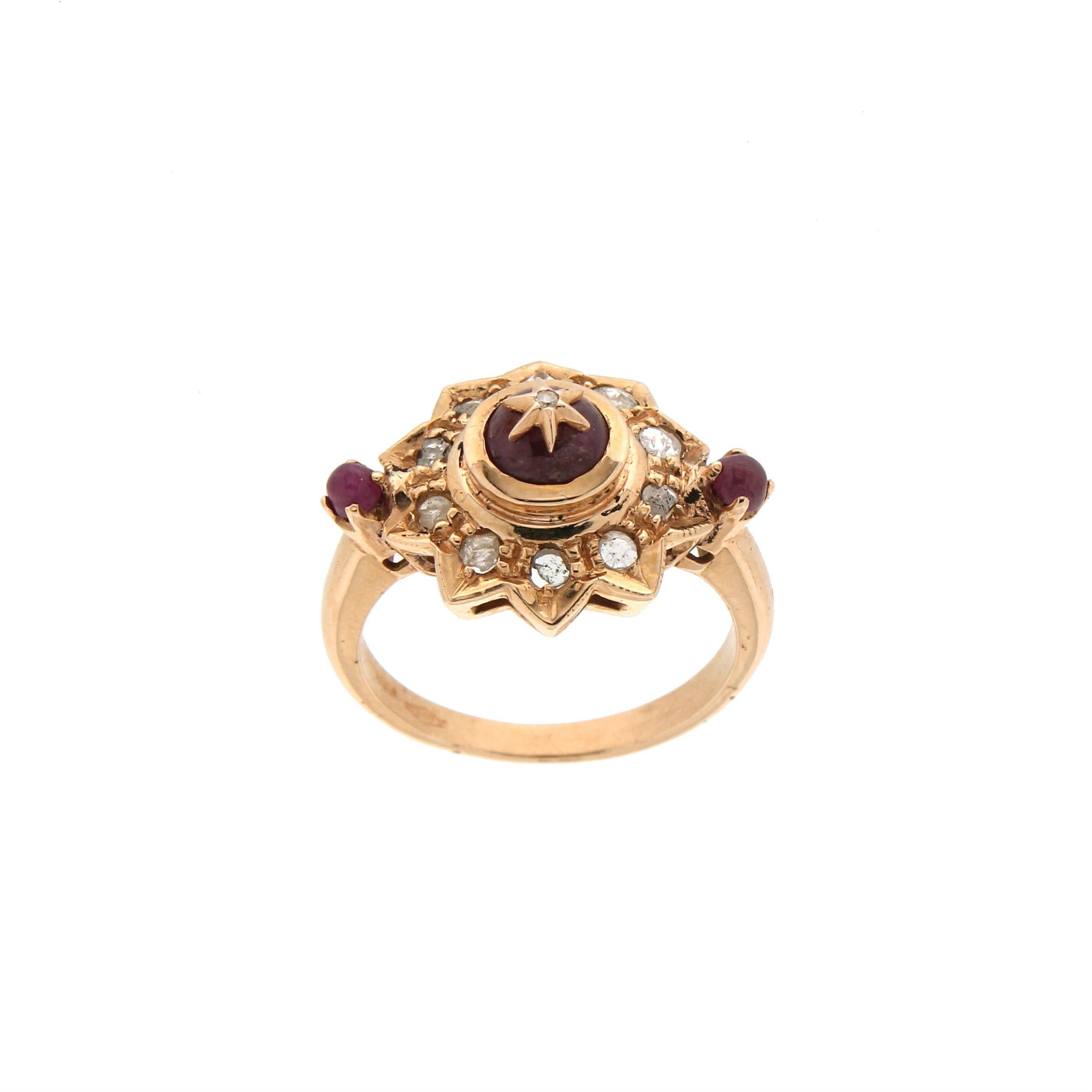 9 karat yellow gold cocktail ring. Handmade by artisans assembled with rose cut diamonds and rubies.

Ring total weight 5.30 grams
Ring size 7.70 US 15.90 Ita
(all rings are can be resized)