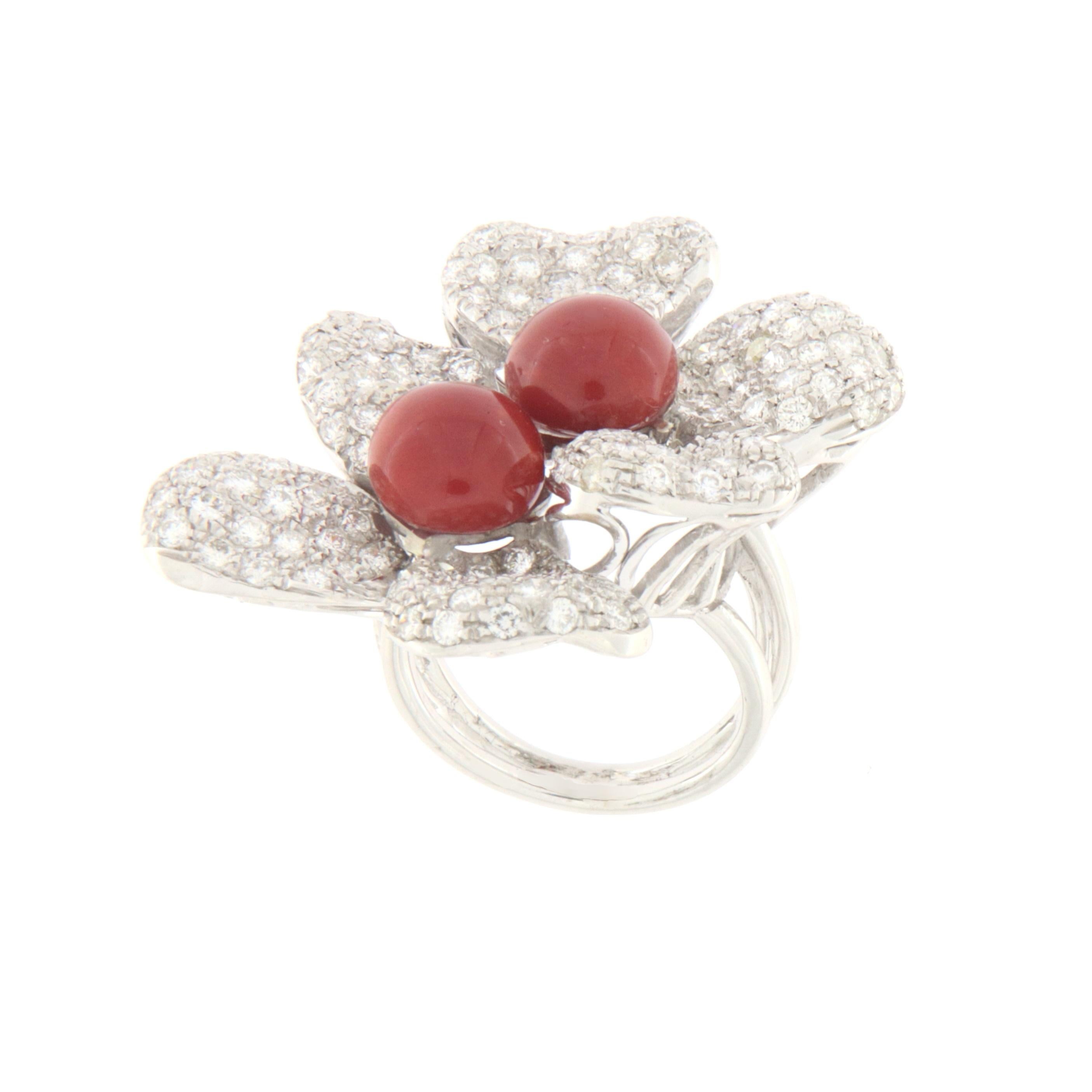 18 karat white gold cocktail ring.Handmade by our artisans assembled with natural sardinian coral and diamonds

Ring weight 16.10 grams
Diamonds weight 3.05 karat
Coral weight 2 grams
Ring size 7 US 14 ITA 
(all rings are can be resized)