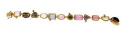 Manschettenarmband aus 14 Karat Gelbgold mit Halbedelsteinen handgefertigt