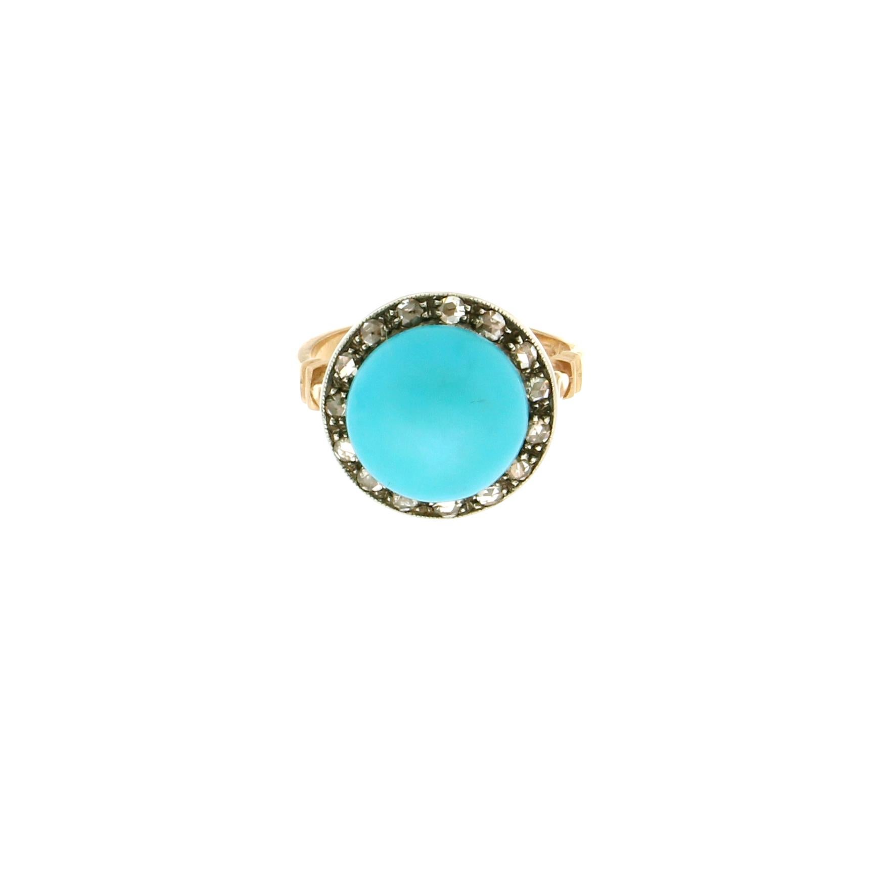 14 karat yellow gold and 800 thousandths silver cocktail ring. Handmade by our artisans assembled with Arizona turquoise and rose cut diamonds.

Ring total weight 6.20 grams
Rose cut diamonds weight 0.35 karat
Turquoise weight 1.40 grams
Ring Size 8