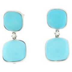 Orecchini a goccia artigianali in turchese e oro bianco 18 carati con diamanti