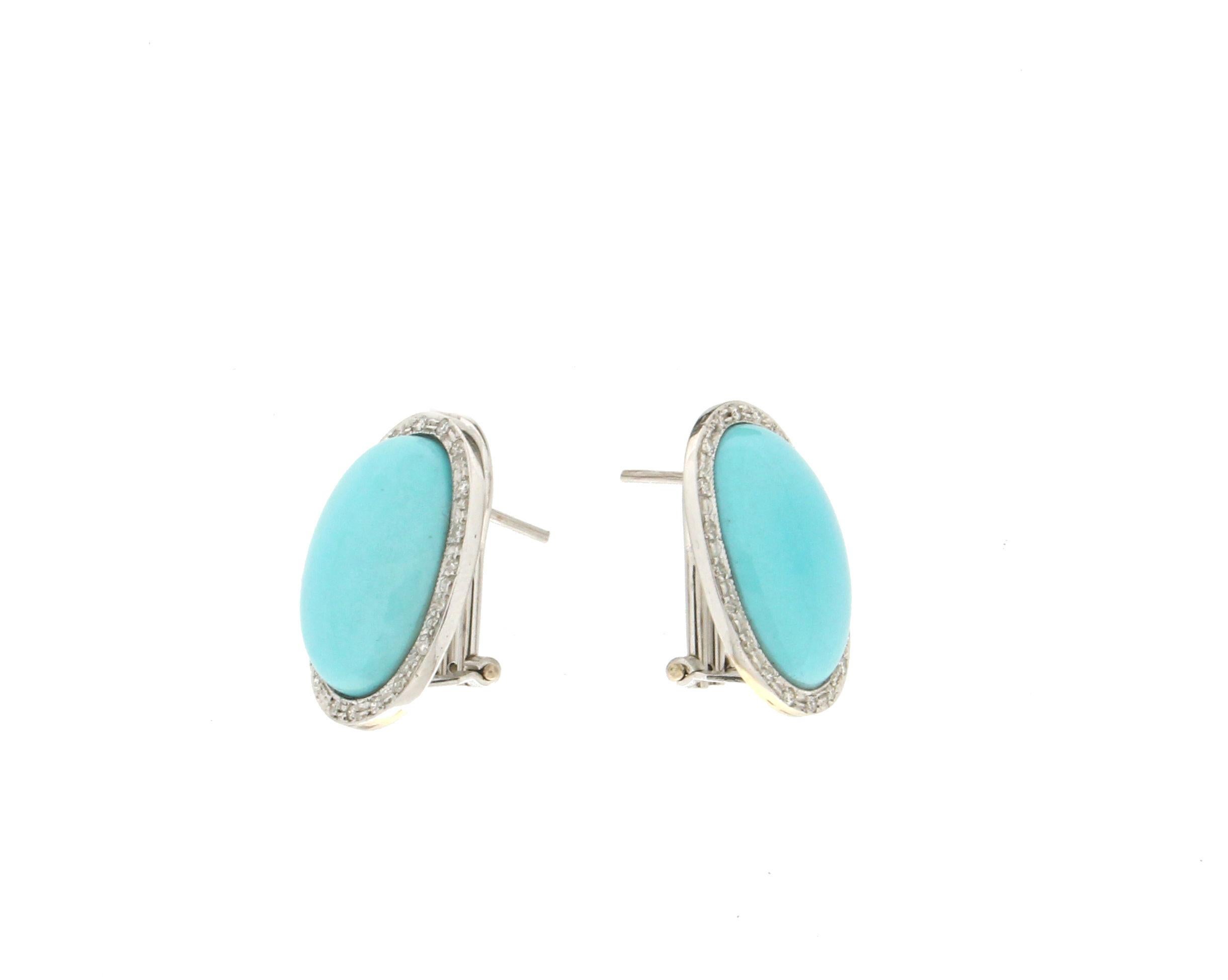 18 Karat white gold stud earrings. Handmade by our craftsmen assembled with turquoise and diamonds.

Diamonds weight 0.30 karat
Turquoise weight 9 grams
Earrings total weight 14.40 grams