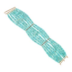 Bracelet manchette artisanal en or jaune 9 carats et turquoise