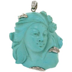 Collier pendentif artisanal en or blanc 18 carats avec turquoise et diamants en forme de visage