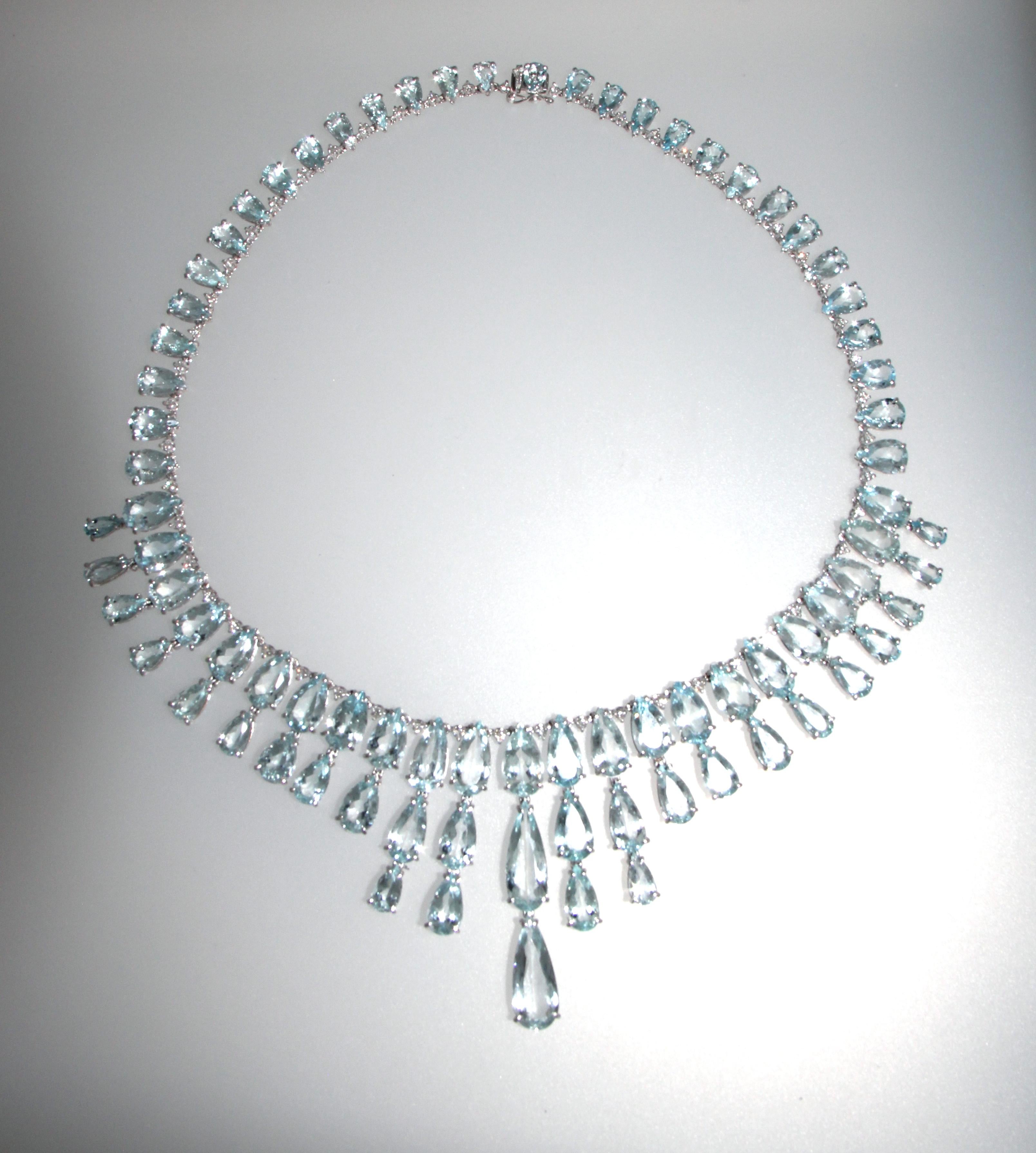Spectacular 18-karat white gold necklace made entirely by hand by our artisans and composed of 82 pear cut Brazilian aquamarines, all mobile pendants separated from each other by diamonds.

The total weight of the necklace is 65.70 grams

The weight