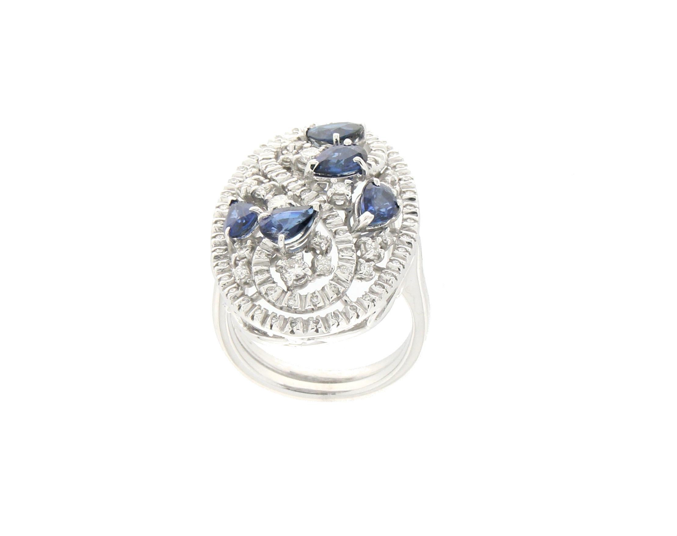 18 karat white gold cocktail ring. Handmade by our artisans assembled with diamonds and sapphires

Diamonds weight 0.73 karat
Sapphires weight 2.40 karat
Ring total weight 14.20 grams
Ring size 8 US 16.80 Ita

(all rings are can be resized)
