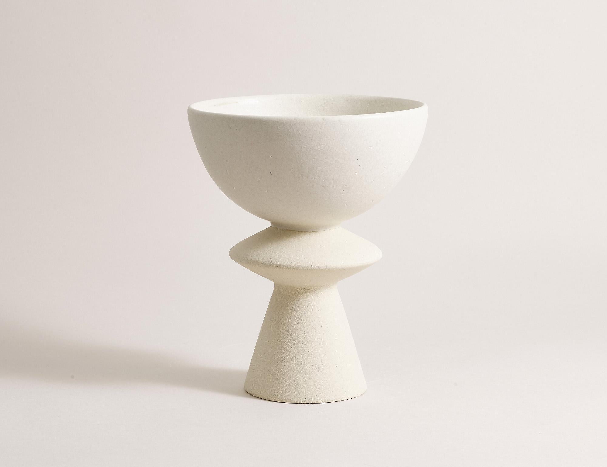 Handcrafted 012 Coupe by Lovebuch
Dimensions: Ø 21 x H 26 cm
Materials: Sandstone, handcrafted piece

Katia works with wood and clay, these raw, powerfully expressive materials are shaped to create a poetry of objects that inhabit our daily