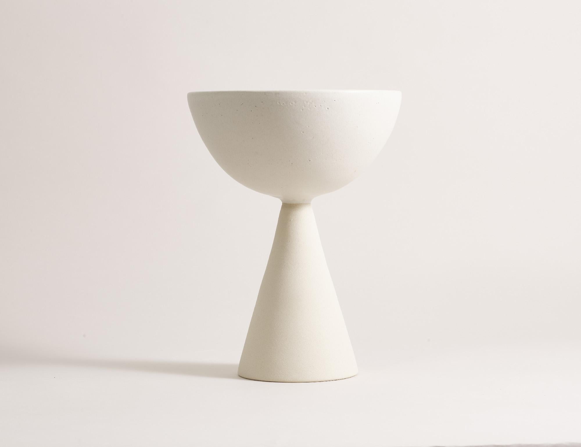 Handcrafted 014 Coupe by Lovebuch
Dimensions: Ø 21 x H 26 cm
Materials: Sandstone, handcrafted piece

Katia works with wood and clay, these raw, powerfully expressive materials are shaped to create a poetry of objects that inhabit our daily