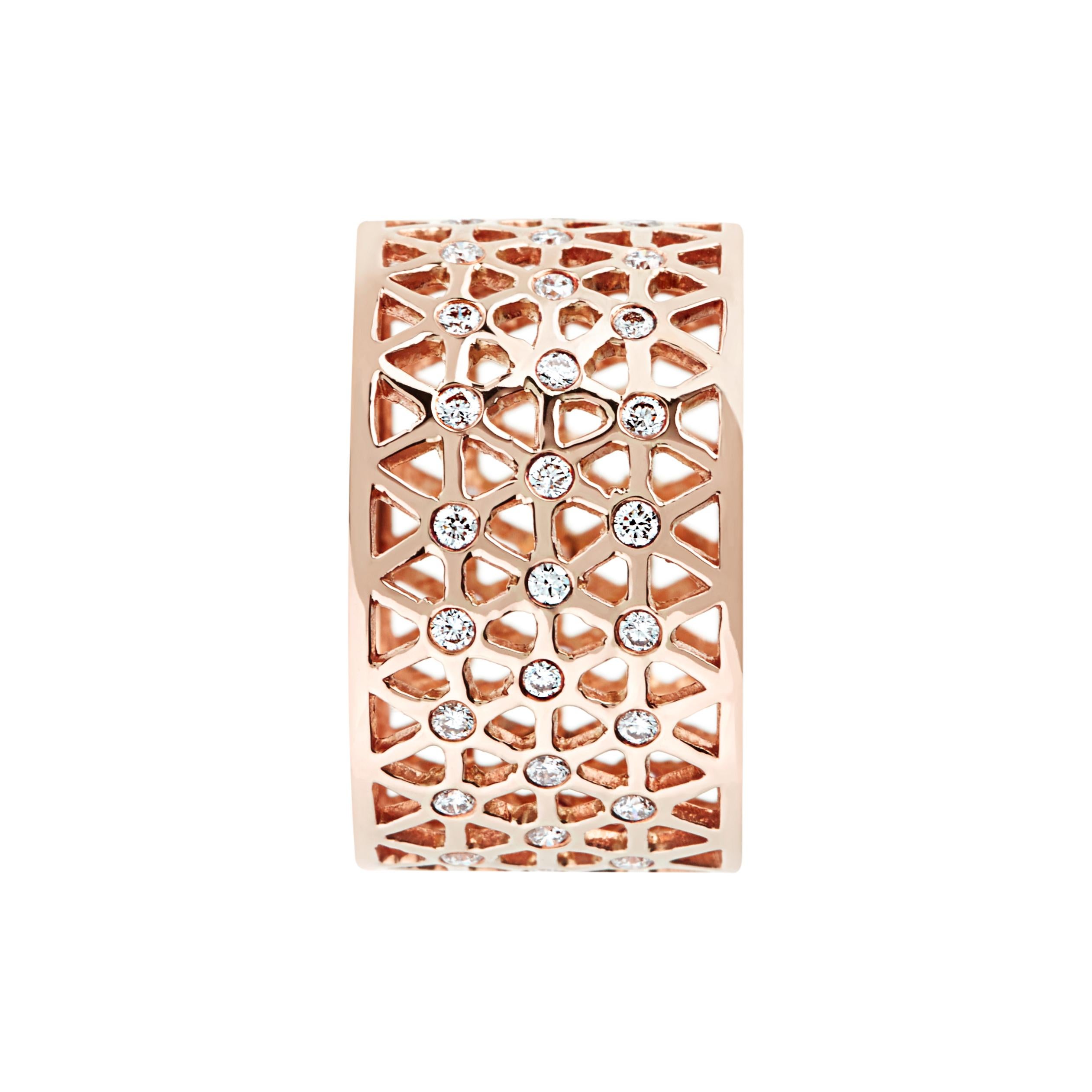 Handcrafted 0.19 Carat Diamonds 18 Karat Rose Gold Band Ring. Delicate hand pierced band ring adorned with white diamonds. Can be worn both with a casual outfit for an every day look or with a more elegant outfit. Showcasing our designer's signature