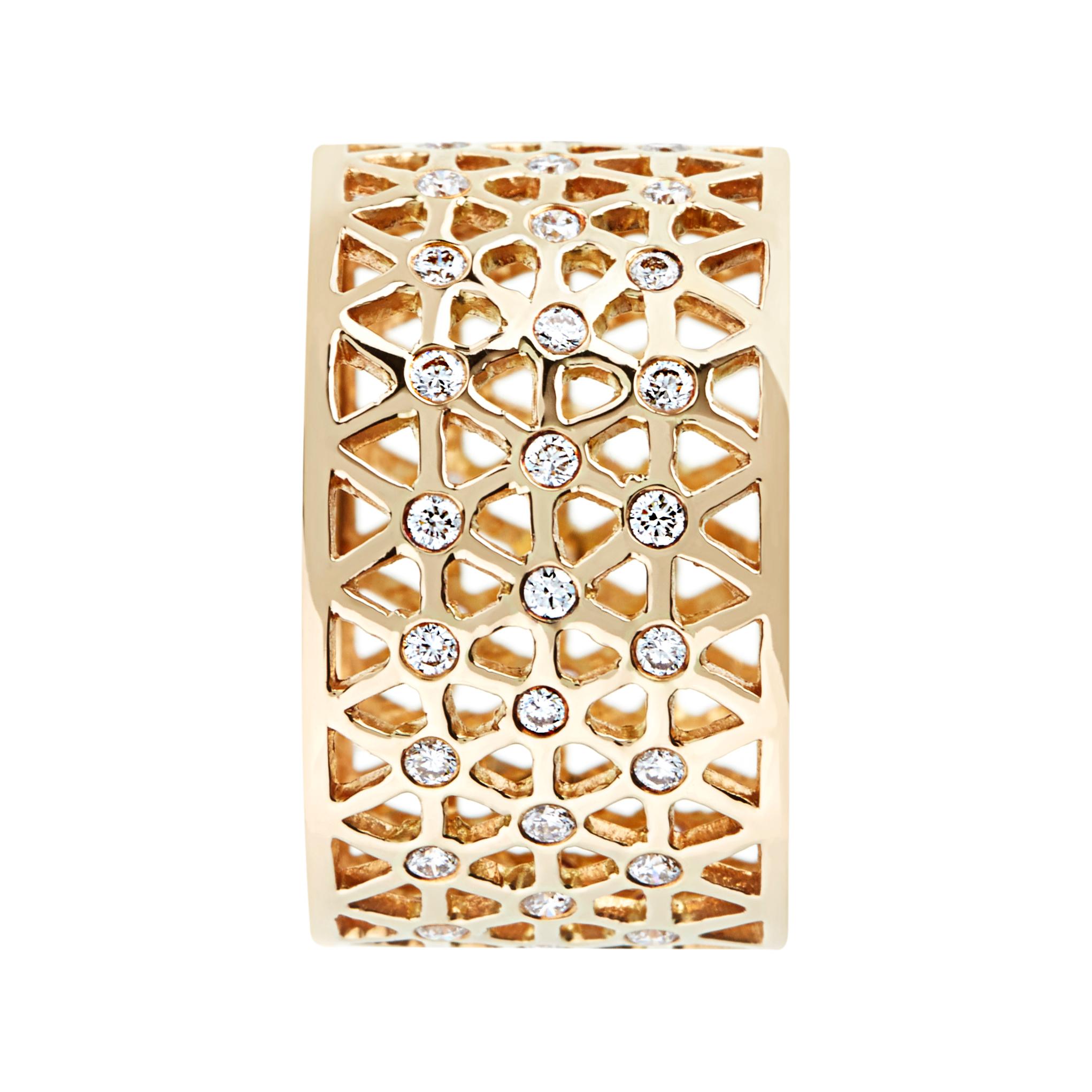 Handcrafted 0.19 Carat Diamonds 18 Karat Yellow Gold Band Ring. Delicate hand pierced band ring adorned with white diamonds. Can be worn both with a casual outfit for an every day look or with a more elegant outfit. Showcasing our designer's