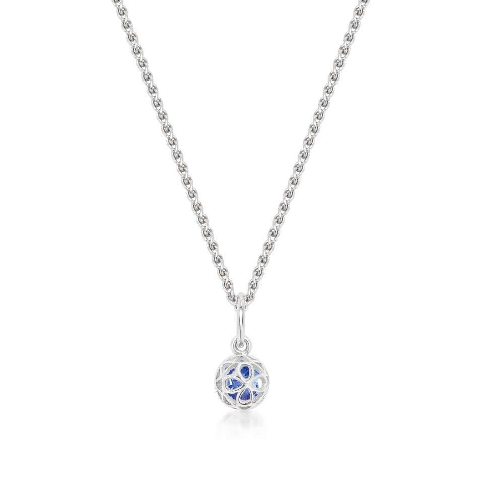 Handcrafted 0.65 Carat Blue Sapphire 18 Karat White Gold Pendant Necklace. The 5mm natural stone is set in our iconic hand pierced gold lace to let the light through. Our pendants are the ideal gift. 

Here presented on our finely knitted gold