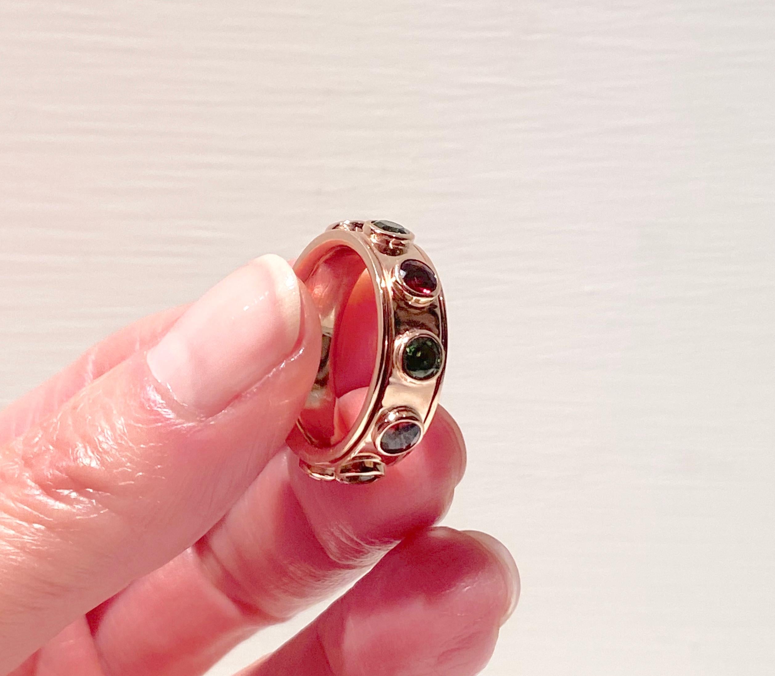 Women's or Men's Contemporary Rotating Rose Gold Tourmaline & Garnet Band Design Ring For Sale