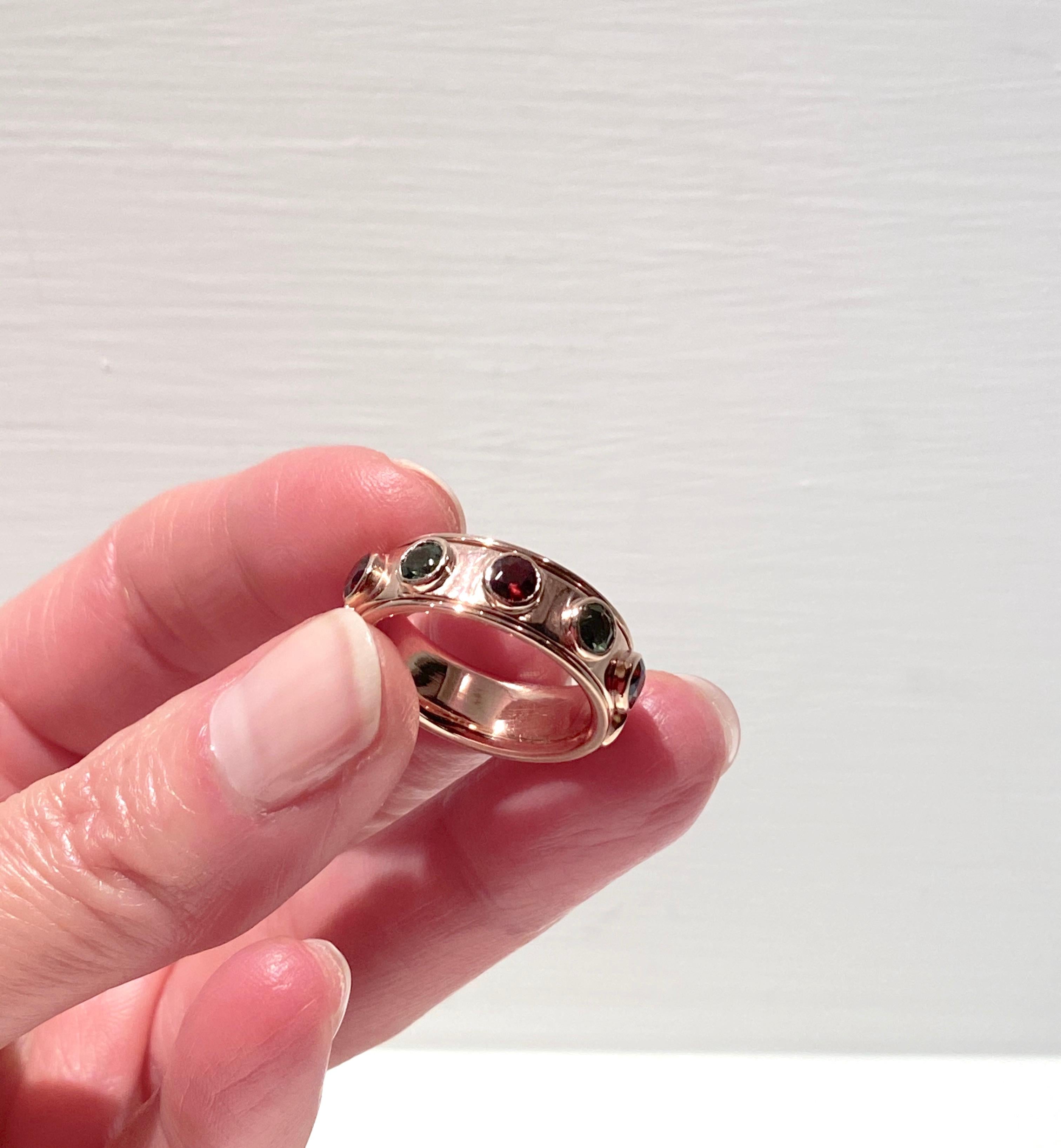 Brilliant Cut Contemporary Rotating Rose Gold Tourmaline & Garnet Band Design Ring For Sale