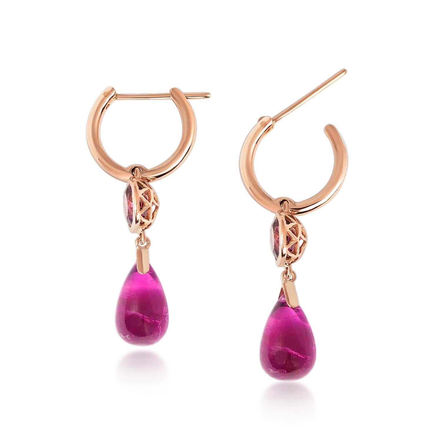 Handcrafted 1,05 & 4,85 Carats Rubelite 18 Karat Rose Gold Drop Earrings. Dancing drops carved in Rubelite under a set of 6mm round Rubelite stones encased in our iconic hand pierced gold lace to let the light through. A diamond has been set on the