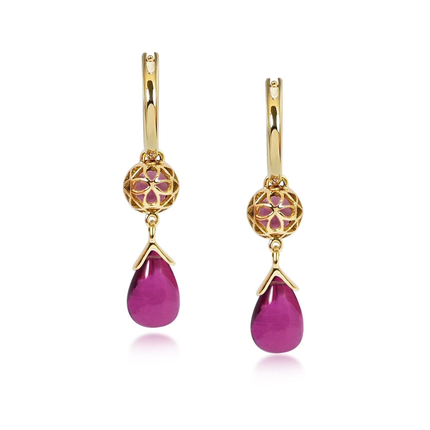 Handcrafted 1.05 & 4.85 Carats Rubelite 18 Karat Yellow Gold Drop Earrings. Dancing drops carved in Rubelite under a set of 6mm round cut Rubelite stones encased in our iconic hand pierced gold lace to let the light through. A diamond has been set